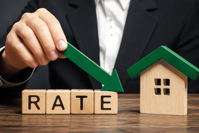 Green upward arrow representing improving refinance opportunities and lower mortgage rates for Dallas Texas homeowners considering their home selling options before accepting a cash offer from Best Texas House Buyers
